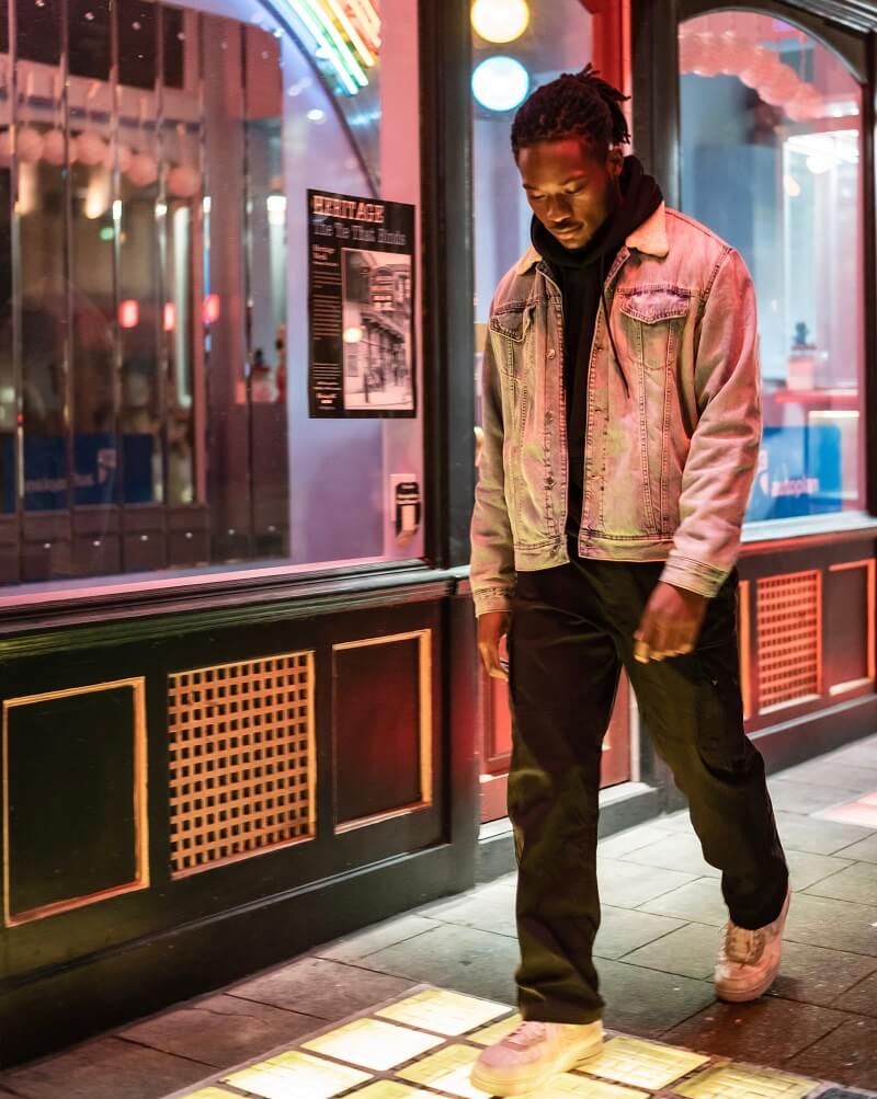 men standing out side the bar and wearing denim jacket