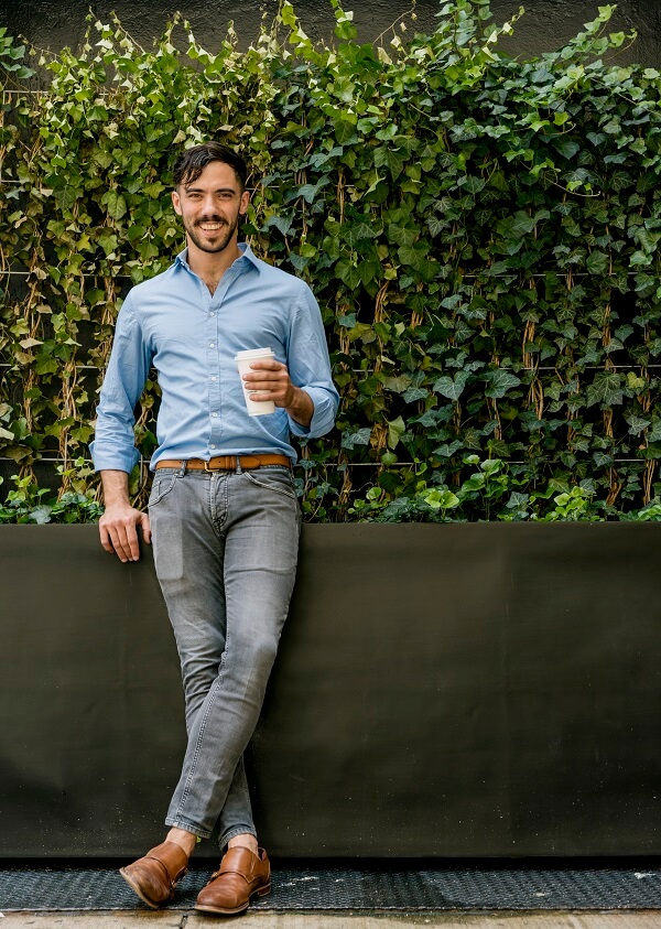 stylish young man wearing branch outfit