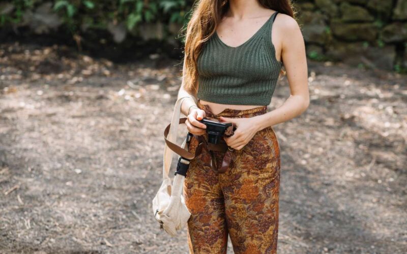 young woman with camera